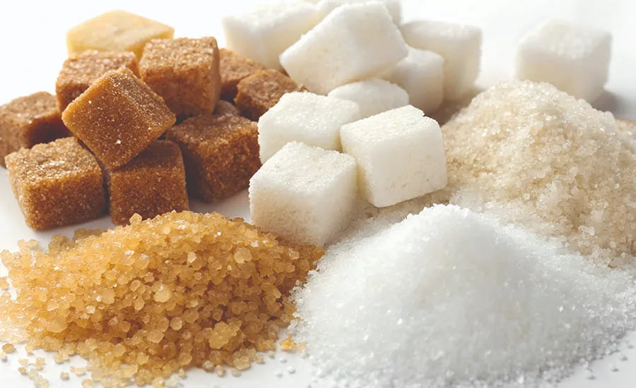 Økologisk brunt og hvitt sukker og sukkerbiter